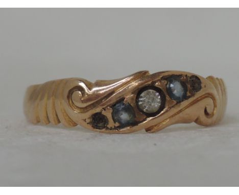 A Victorian 15ct gold band ring set with paste stones,  approx 2.2g