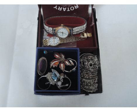 A small selection of white metal jewellery including enamelled leaf brooch, dress rings, filligree bracelet, pendant etc and 