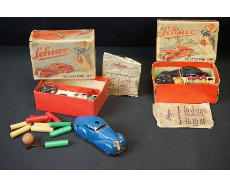 Two boxed Schuco 3000 Telesteering Car tin plate model sets to include one in blue (complete with accessories) and one in bla