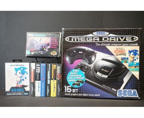 Retro Gaming - Boxed Sega Mega Drive console with 2 x controllers plus 7 x boxed games to include Sonic the Hedgehog, F22, Ay
