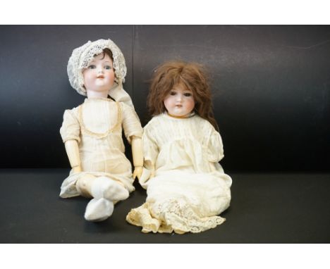 Two Early 20th century Armand Marseille Bisque Head Dolls, one with impressed marks ‘ 390 A.11.M ‘ with sleeping blue eyes, o