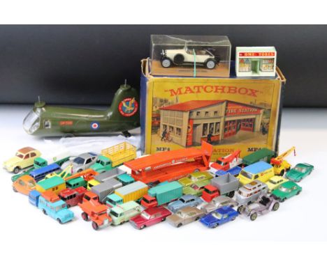 Boxed Matchbox Lesney MF-1 Fire Station (model grubby &amp; loss to corner of roof; box shows heavy wear); together with over