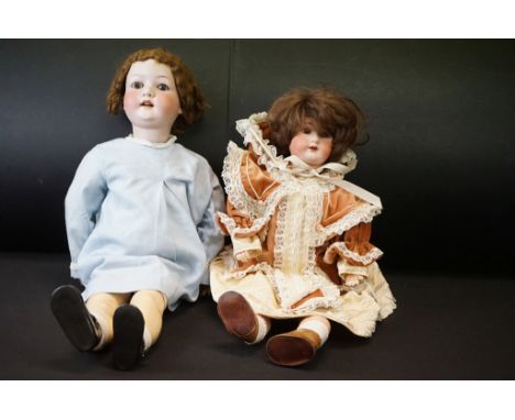 Two Early 20th century Heubach Koppelsdorf Bisque Head Dolls, one with impressed marks 250.3 with sleeping brown eyes and ope