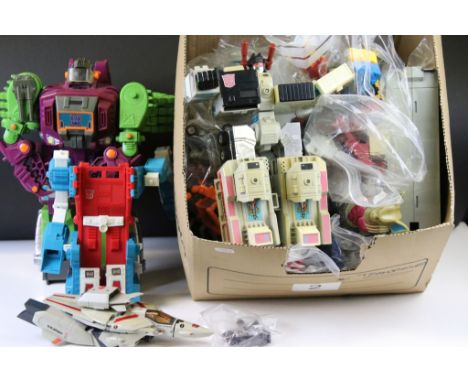 Collection of approximately 50 original G1 Hasbro Takara Transformers figures to include Ultra Magnus, Decepticon Leader Mega