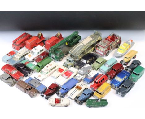 40 Mid 20th C play worn Dinky diecast models to include 40A Riley, 268 Renault Dauphine Mini Cab, Supertoys Heavy Tractor, 17