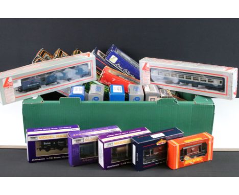 21 Boxed OO gauge items of rolling stock to include coaches, vans and tankers featuring 4 x Palitoy Mainline, 8 x Dapol, 4 x 