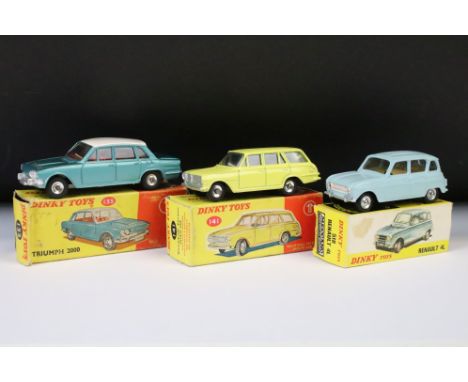 Three boxed Dinky diecast models to include 518 Renault 4L in pale blue, 135 Triumph 2000 in metallic blue with white roof (b