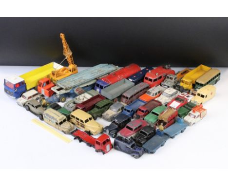 Around 37 mid 20th C. play worn Dinky diecast models to include 344 Plymouth Estate Car, De Tomaso Mangusta, 283 Coach, 180 P