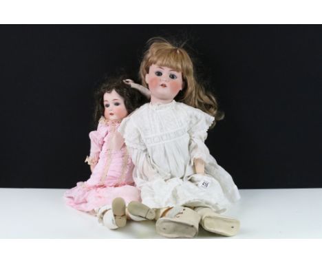 Two Early 20th century Heubach Koppelsdorf Bisque Head Dolls, both with impressed marks A W W and with sleeping blue eyes, op