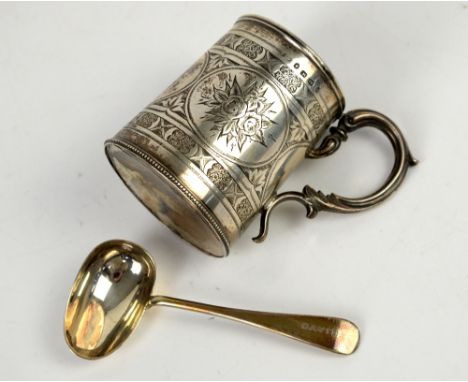 Victorian silver christening mug engraved with panels of flowers, double scroll handle Birmingham 1875, makers mark indistinc