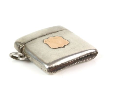 Victorian silver vesta case with a 9ct gold shield form cartouche, Birmingham 1896        