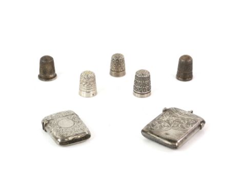 Victorian silver vesta case, with vacant cartouche and scroll chasing, Birmingham 1890, 4 cm high, together with a further si