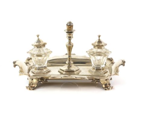 Victorian silver desk stand, with two silver-mounted inkwells and a taper stick, engraved with presentation inscription, by J