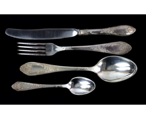 Possibly Russian table-service for twelve place-settings, comprising table knives, forks, spoons, dessert knives, forks, spoo