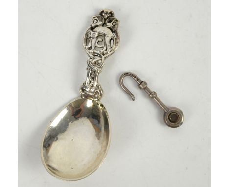 Norwegian silver caddy spoon, By Thune and stamped 830S, with hammered bowl and stem decorated with a cat, 11.5 cm long, toge