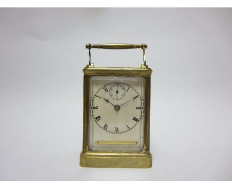 "A late 19th Century English Carriage Clock, the dial with Roman numerals and subsidiary seconds dial, inscribed T & E Grafto