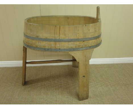 "An antique coopered pine Cheese Making Bin on tripod base, 32in W x 34in H"