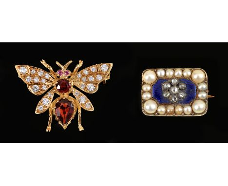 "A Garnet and Diamond Butterfly Brooch the body set circular and pear-cut garnets and brilliant-cut diamonds pavé-set to wing