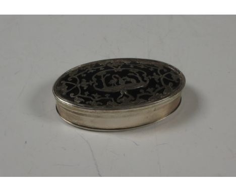 "A 19th Century white metal and tortoiseshell Snuff Box with overlaid foliate design with central cartouche of Egyptian anima
