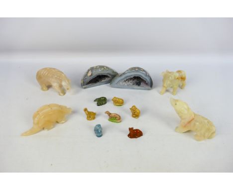 A collectable lot to to include two light blue geode crystals. 4 x onyx marble animal figures to include bull, two bears, din