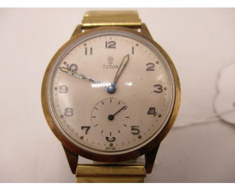 A Tudor 9ct gold gents manual wind wristwatch hallmarked Edinburgh 1958. The dial having Arabic numerals and subsidiary secon