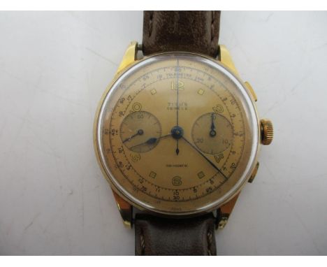 A Titus chronograph 18ct gents manual wind wristwatch circa 1950's. The dial having blued hands and subsidiary dials for seco