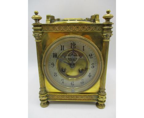 A Late 19th/early 20th century French gilt metal carriage clock with integrated thermometer and compass to the top. The dial 