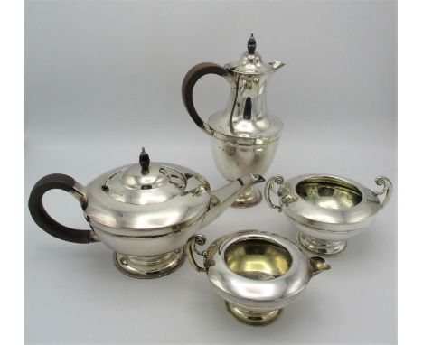 An Art Deco period silver tea and coffee set by T. Wilkinson &amp; Sons, 1921, Birmingham, comprising a tea pot, a coffee pot