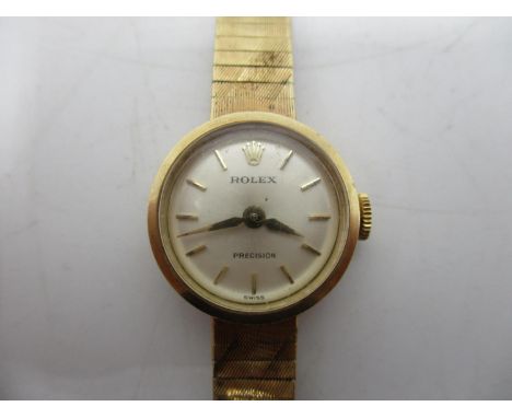A Rolex Precision 9ct gold ladies manual wind wristwatch circa 1960s. The case back hallmarked 375 and numbered 23550, fitted
