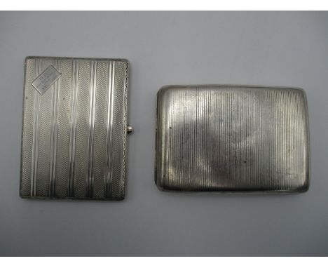 A George V silver cigarette card case by James Dixon &amp; Sons Ltd, Sheffield 1927, of rectangular form with engine turned d