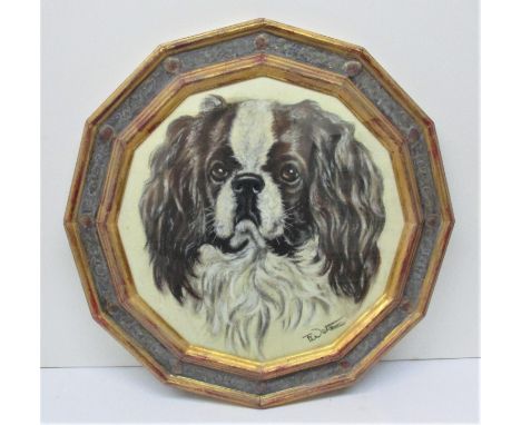 British School, 19th century
medallion portrait of a cavalier King Charles spaniel, pastel on paper, indistinctly signed lowe