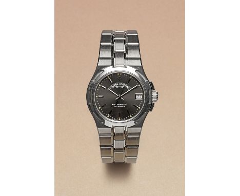 Case: Stainless steel case with integrated stainless steel bracelet; Dial: Anthrazit-grey Dial with applied gold indeces, tri