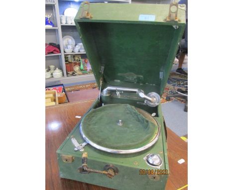 A retro record player and a green cased table top gramophone 