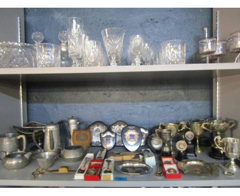 A selection of motorcycle silver and silver plated trophy cups, trophy plaques, enamel spoons and other items, along with oth