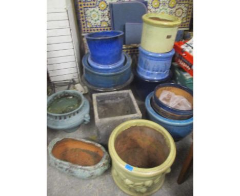 Mixed garden planters to include ceramic glazed planters, twin handled urn shaped planter and others 