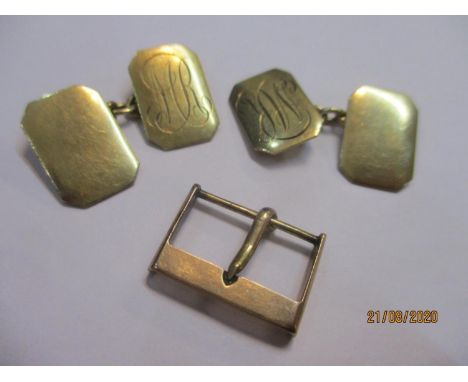 A pair of 9ct gold cufflinks and a 9ct gold watch strap buckle 