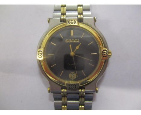 A gents Gucci stainless steel and gold plated wristwatch 