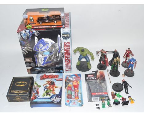 Collection of Super hero models incl. boxed and sealed Optimus Prime voice changing helmet, 7 resin painted Marvel figures (s