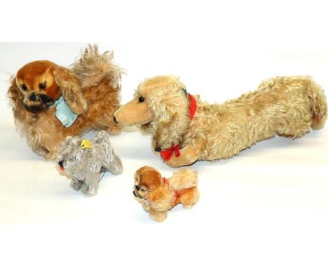 Four mid C20th Steiff dogs, including two 'Peky' Pekingese, a  small grey terrier and a dachshund,  max L43 