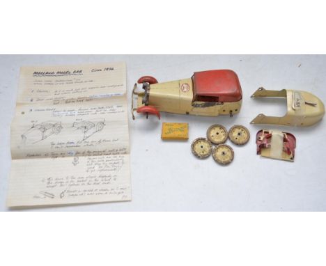 Vintage mid 30's tin plate Meccano clockwork car model with hand written instructions for construction of 3 variants. With ke