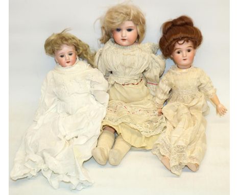 German bisque head dolls, including Recknagel marked R A 21 6/0, Shoenau Hoffmeister 4000 2/0, and an Armand Marseille doll H
