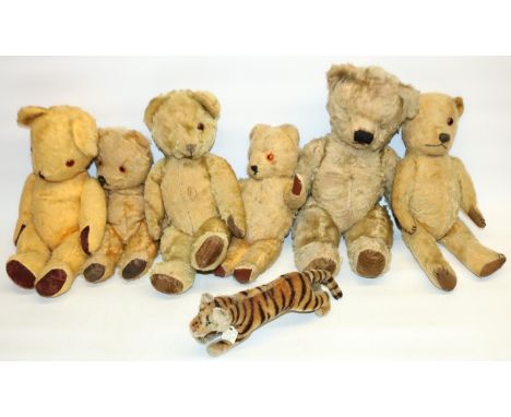 Six mid C20th blonde mohair teddy bears and a Steiff tiger, L24cm (7) 