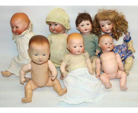 Bisque head baby dolls, including four marked Armand Marseille, one marked Simon Halbig 126 / 42, and another marked Heubach 