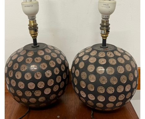 A pair of ceramic orb lamps 