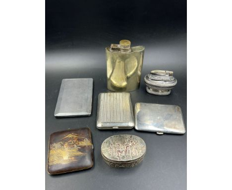 A selection of white metal items to include hip flask, cigarette cases, pill box and a Ronson lighter