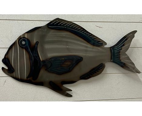 A metal wall art of a fish 66cm x 37cm 