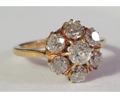 An 18ct Yellow Gold Diamond Seven Stone Cluster Ring, size K, 3.4g, EDW.8ct