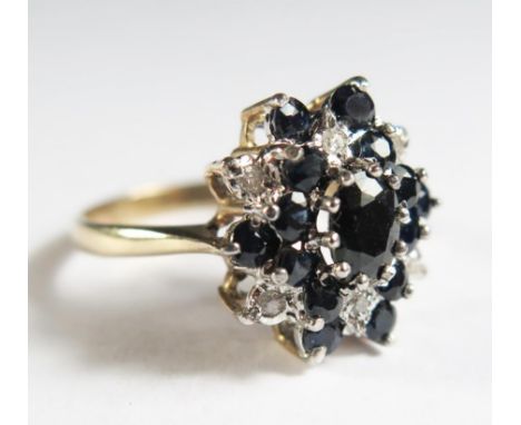 A 9ct Gold, Sapphire and Diamond Cluster Ring, size R.5, 4.9g 