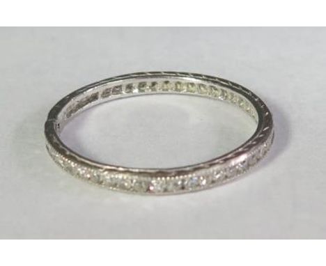 A Diamond Full Eternity Ring in a precious white metal setting, size K.5, 1.5g 