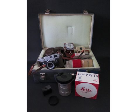 A Leica M2 - 1103699 35mm Camera, Elmar 1935045 1:2.8/50 lense, Elmarit 2315791 1:2.8/28 lense, Elmarit 2127560 1:2.8/90 lens